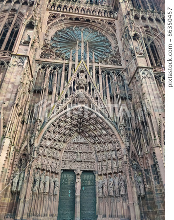 Cathedral of Our Lady or Cathedrale Notre-Dame de Strasbourg, Cathedrale de Strasbourg, Strasbourg Minster in Strasbourg, France. The Roman Catholic cathedral was built in 1176-1439 in Romanesque. 86350457
