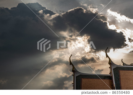 The roof of the Thai temple, along with the gable at the top of the temple roof that receives on beautiful sun. The roof of the Thai temple, along with the gable at the top of the temple roof that receives on beautiful sun. 86350480