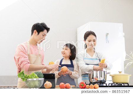 Home time: Family enjoying cooking Home time: Family enjoying cooking 86351567