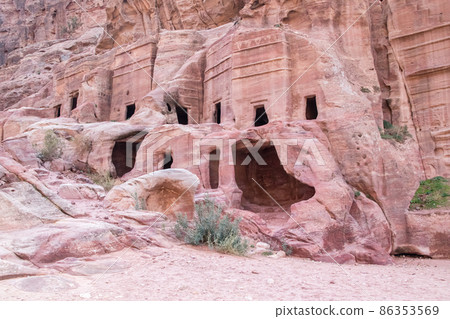 View of cave at street of facades in Petra (Red Rose City), Jordan. Petra is UNESCO World Heritage Site and is one of New7Wonders of the World. 86353569