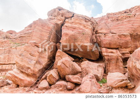 Huge rocks in Petra (Red Rose City), Jordan. Petra is UNESCO World Heritage Site and is one of New7Wonders of the World. Huge rocks in Petra (Red Rose City), Jordan. Petra is UNESCO World Heritage Site and is one of New7Wonders of the World. 86353573