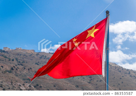 Flag of China also known as the Five-starred Red Flag waving in the wind. 86353587