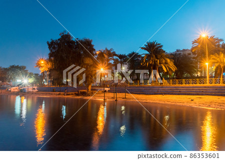 Seaside boulevard on Aqaba gulf in the early morning. Seaside boulevard on Aqaba gulf in the early morning. 86353601