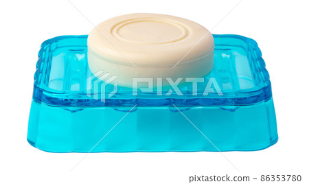 New soap on a dish isolated on white background New soap on a dish isolated on white background 86353780