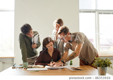 Business Team Working on Project in Office Business Team Working on Project in Office 86353910