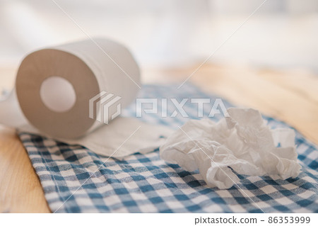 Toilet paper on the table 86353999