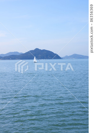 With the sea and yachts. 86356369