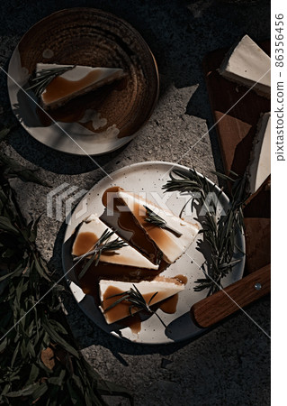 Slice of cheesecake with caramel sauce Slice of cheesecake with caramel sauce 86356456