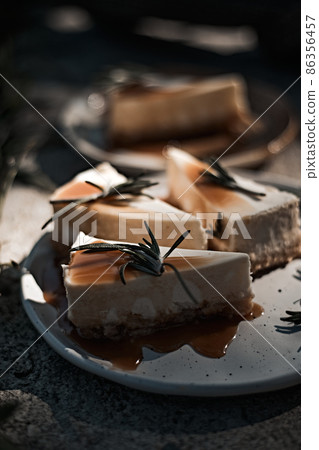 Slice of cheesecake with caramel sauce Slice of cheesecake with caramel sauce 86356457