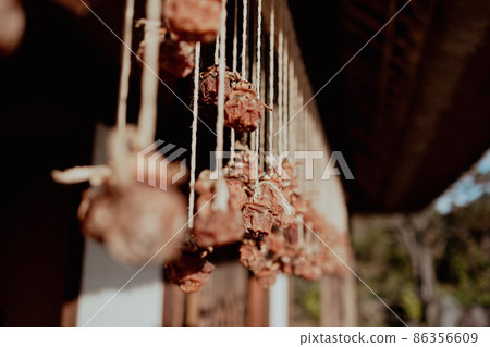 Dried persimmon at the eaves 86356609