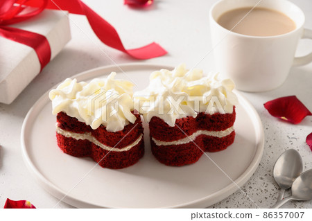 Red velvet cake in shape of hearts for Valentine's day. Tasty dessert. Red velvet cake in shape of hearts for Valentine's day. Tasty dessert. 86357007