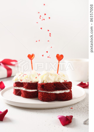 Red velvet cakes in shape of hearts for Valentine's day. Tasty dessert. 86357008