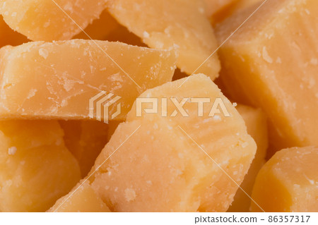 Parmesan cheese close up - full screen 86357317