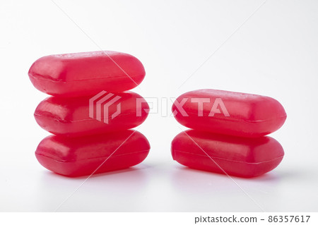 Pieces of pink soap isolated on white background 86357617