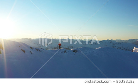 Mountaineer backcountry ski walking ski alpinist in the mountains. 86358182