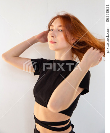 White young european woman on grey 86358631