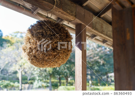 Sugitama hung from the eaves of an old folk house Sugitama hung from the eaves of an old folk house 86360493
