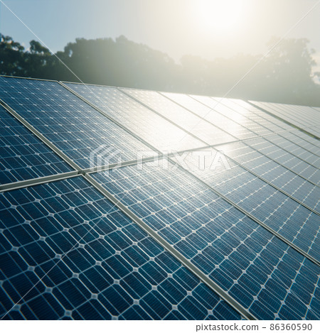 Sun is reflecting from private solar panel system cells 86360590