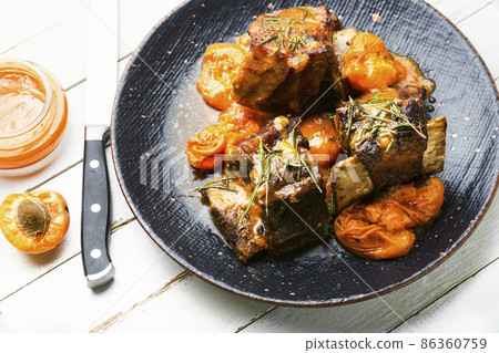 Pork stewed in fruit gravy 86360759