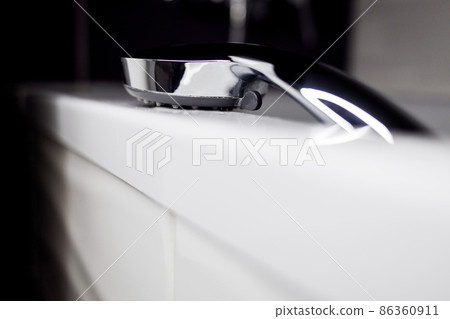 Shower in the bathroom. 86360911