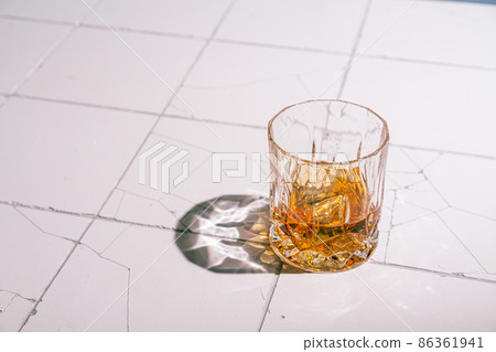 Whiskey with ice in glasses Whiskey with ice in glasses 86361941