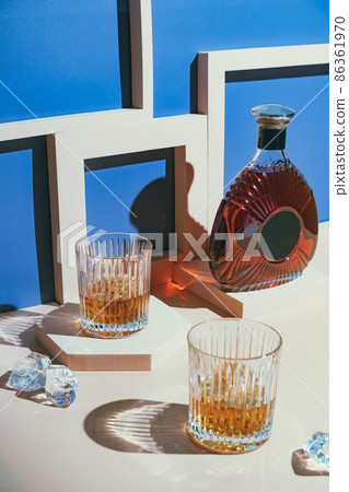 Whiskey with ice in glasses Whiskey with ice in glasses 86361970