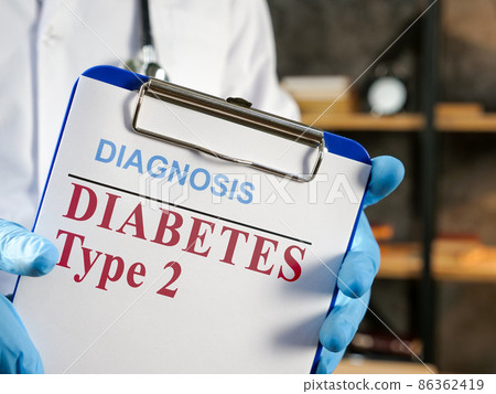Doctor shows diabetes type 2 diagnosis in the medical form. 86362419