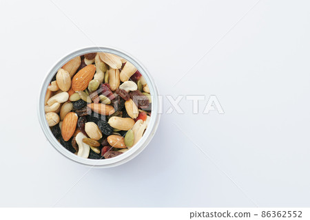 close up of many mixed nuts in a container with copy space close up of many mixed nuts in a container with copy space 86362552