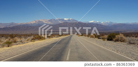 empty road on desert landscape, dry mountainous area, road trip empty road on desert landscape, dry mountainous area, road trip 86363369