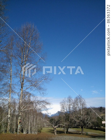 Winter scene in Pucon, Chile, with volcano in background. Winter scene in Pucon, Chile, with volcano in background. 86363372