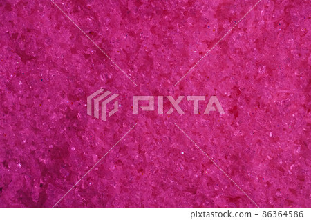 Pink crystals with holographic flakes background 86364586