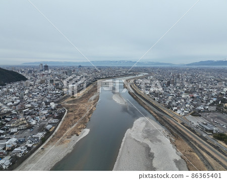 Gifu Castle, Mt. Kinka, scenery around Gifu city, drone aerial photography Gifu Castle, Mt. Kinka, scenery around Gifu city, drone aerial photography 86365401