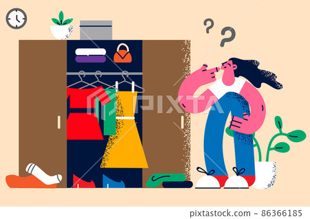 Pensive woman look in wardrobe thinking about clothes  86366185