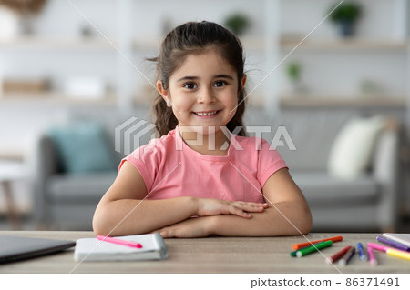 Beautiful Child Portrait. Cute Preteen Arab Girl Posing At Home Interior Beautiful Child Portrait. Cute Preteen Arab Girl Posing At Home Interior 86371491