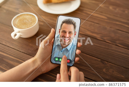 Virtual meeting. Unrecognizable lady having video call with husband on cellphone while sitting in cafe, creative collage Virtual meeting. Unrecognizable lady having video call with husband on cellphone while sitting in cafe, creative collage 86371575