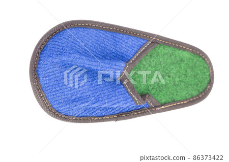 Slippers made of felt have a blue-green color. Slippers made of felt have a blue-green color. 86373422