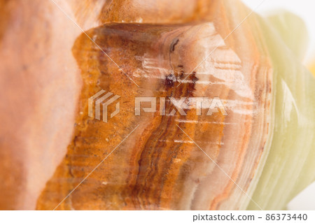 The texture of green onyx with brown veins. The texture of green onyx with brown veins. 86373440