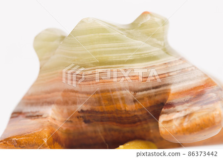 The texture of green onyx with brown veins. The texture of green onyx with brown veins. 86373442