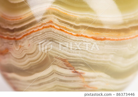 The texture of green onyx with brown veins. 86373446