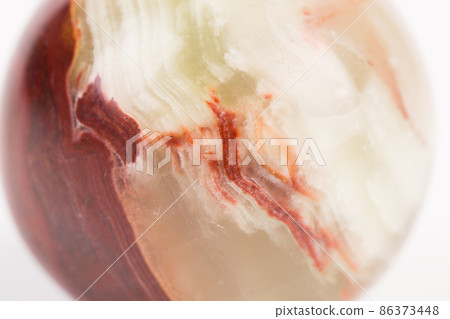 The texture of green onyx with brown veins. The texture of green onyx with brown veins. 86373448