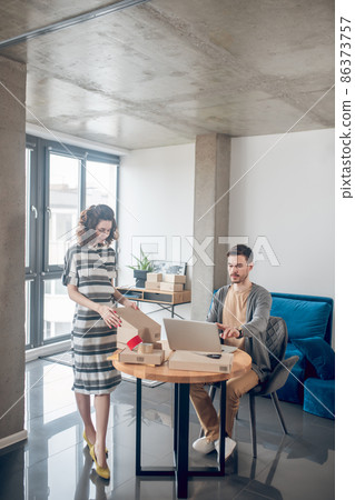 Internet shop worker and his coworker focused on their work 86373757