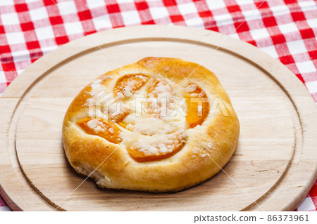 apricot pie on wooden board apricot pie on wooden board 86373961