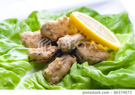 fried surimi stick with lemon fried surimi stick with lemon 86374073