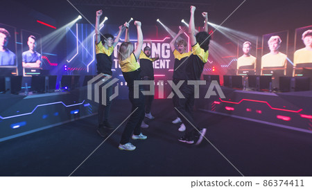 Excited team supporting each other before gaming tournament Excited team supporting each other before gaming tournament 86374411