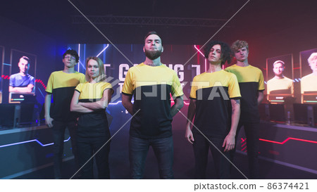 Confident gamers with leader during championship Confident gamers with leader during championship 86374421