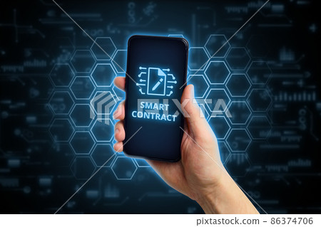 Smart contract concept. Person holding smartphone with agreement icon. 86374706