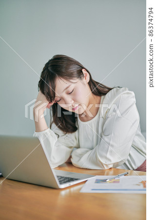 Telework (remote) tired young woman Telework (remote) tired young woman 86374794