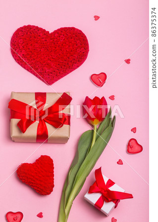alentine's Day concept with gift boxes, flower and hearts on pink background. Flat lay. alentine's Day concept with gift boxes, flower and hearts on pink background. Flat lay. 86375374
