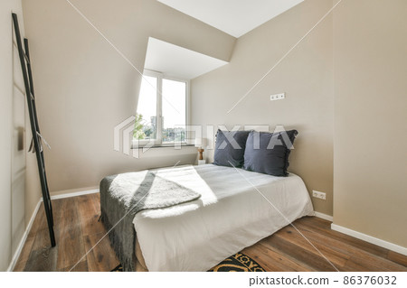 Beautiful bedroom in new luxury home with some decor 86376032