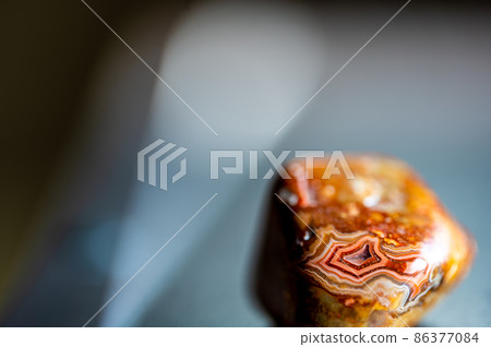 Selective focus on banding of a South Dakota Fairburn agate Selective focus on banding of a South Dakota Fairburn agate 86377084